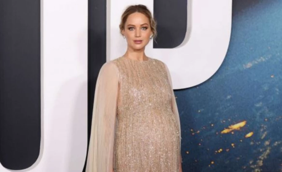 Pregnant Jennifer Lawrence shines in glittering gold gown at 'Don't Look Up' premiere