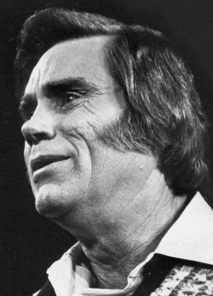 George Jones - (It's the Bible Against the Bottle) The Battle for Daddy's Soul lyrics